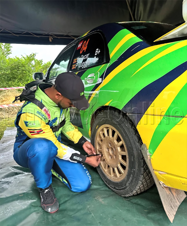 Oscar Ntambi nga yekebejja emipiira gy'emmotoka 