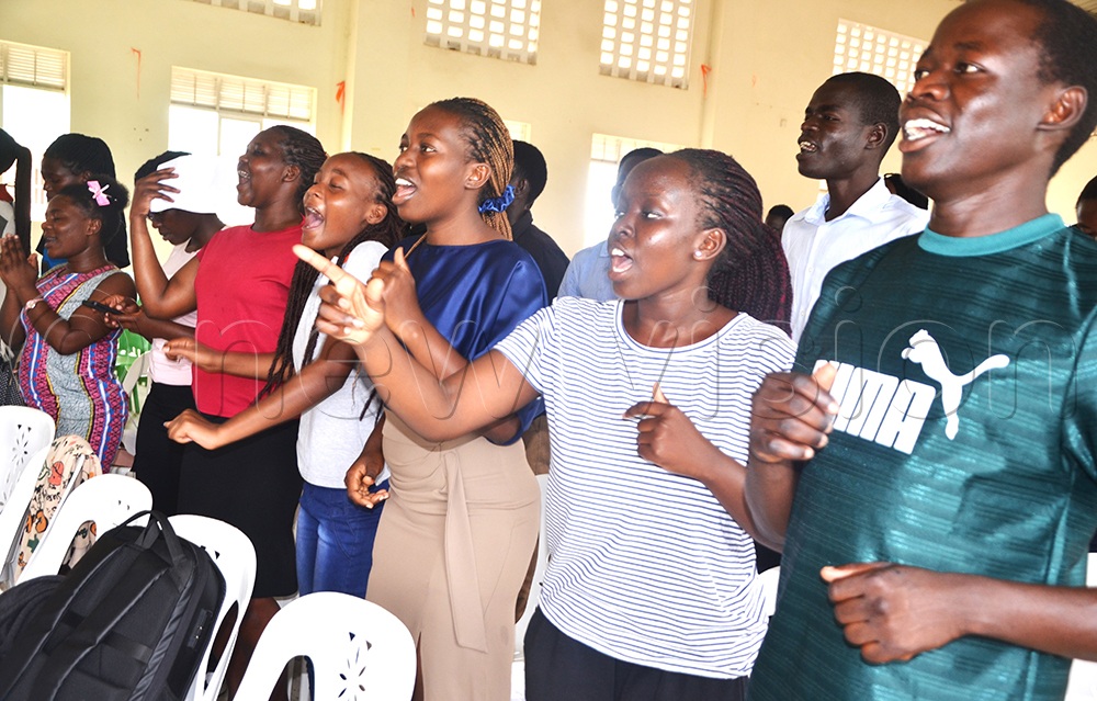 Soroti University students enjoying praise and worship songs during the launch of interfaith prayer breakfast. (Credit: Delux Emmy Alomu)
