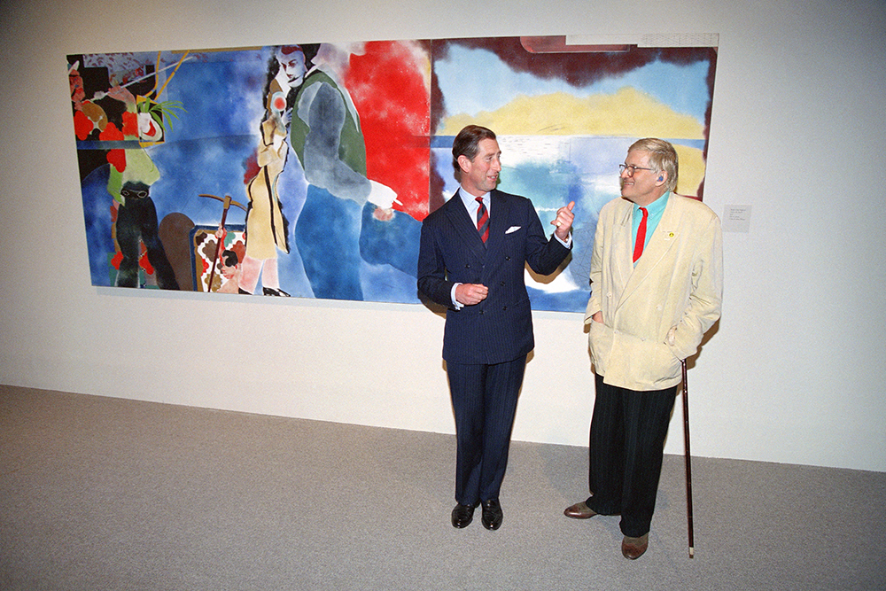Britain's Prince Charles (L) talks to British artist British artist David Hockney during a visit to the Los Angeles Country Museum of Art on November 3, 1994.