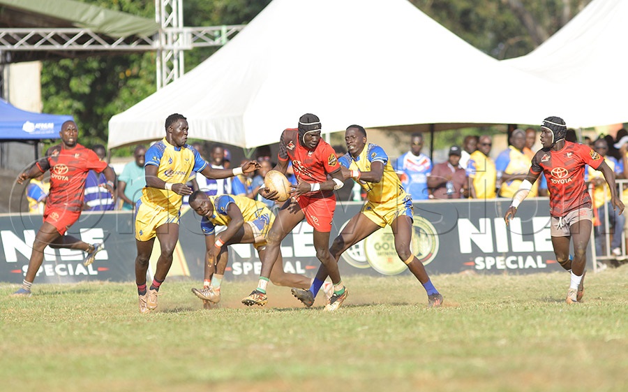 Heathens players try to stop a Buffaloes player during the final of the Lawii Rwodi Rugby 7s tournament in Gulu. Heathens won 12-7. PHOTO BY JOHNSON WERE