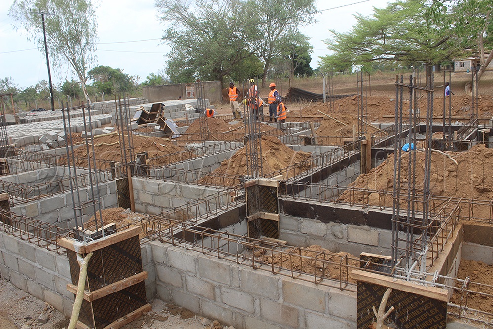 One of the structures being constructed for the disease control centre. Looking on is the Lt. Gen, Peter Elwelu and Soroti district leaders. (Photo by Emmanuel Alomu)