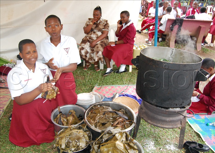 Luganda department students demonstrating the preparation of local dishes. (Credit: Mathias Mazinga)