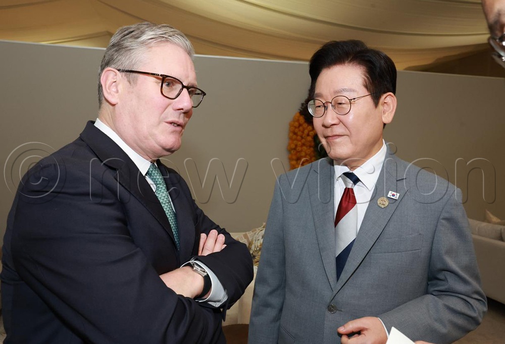 Prime Minister of the United Kingdom, Sir Keir Starmer (L), talking to Korean President Lee Jae Myung (R) during the open session of the G20 Leaders' Summit at the Johannesburg Expo Centre in South Africa. (Credit: Hajarah Nalwadda)