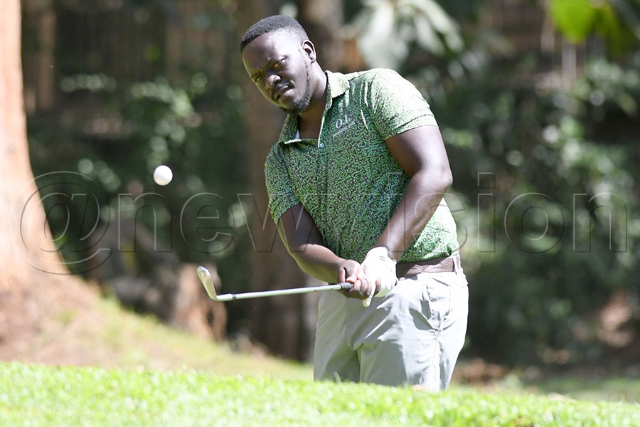 Joseph Kasozi chips to the sixth green during the third round action. Photo by Michael Nsubuga