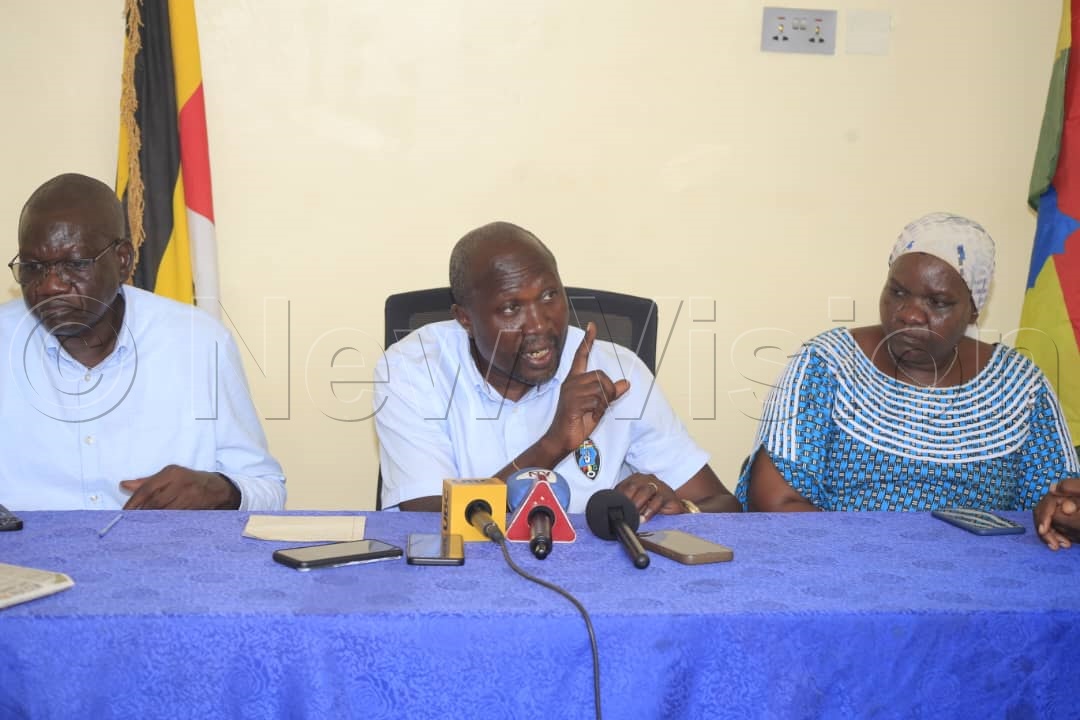 Mafabi (centre) with Amuriat (left) during the brief. (Credit: Alfred Ochwo)