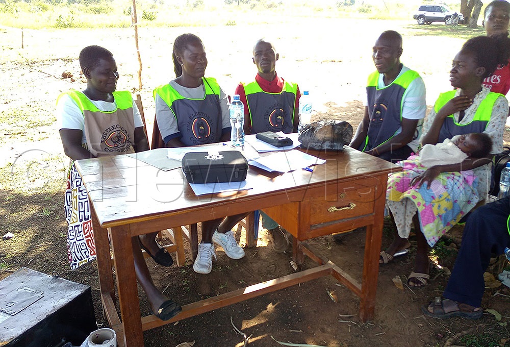 Election officials waiting for voters, in Kalaki district, Otuboi Catholic Church polling station, together with the BVVK operator and other polling Assistants. (Credit: Christine Itado)