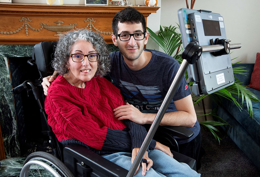 This handout image released by Smartbox Assistive Technology shows Sarah Ezekiel at her home in Hendon, north London on August 16, 2025. (Credit: AFP)