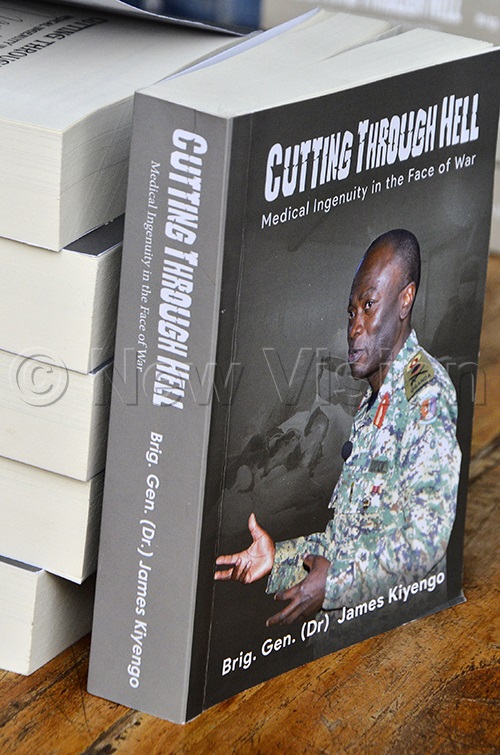A copy of a new book titled “Cutting through Hell” authored by Dr Kiyengo being displayed during the launch at Fairway Hotel Kampala on July 24, 2025. (Photo by Ronnie Kijjambu)