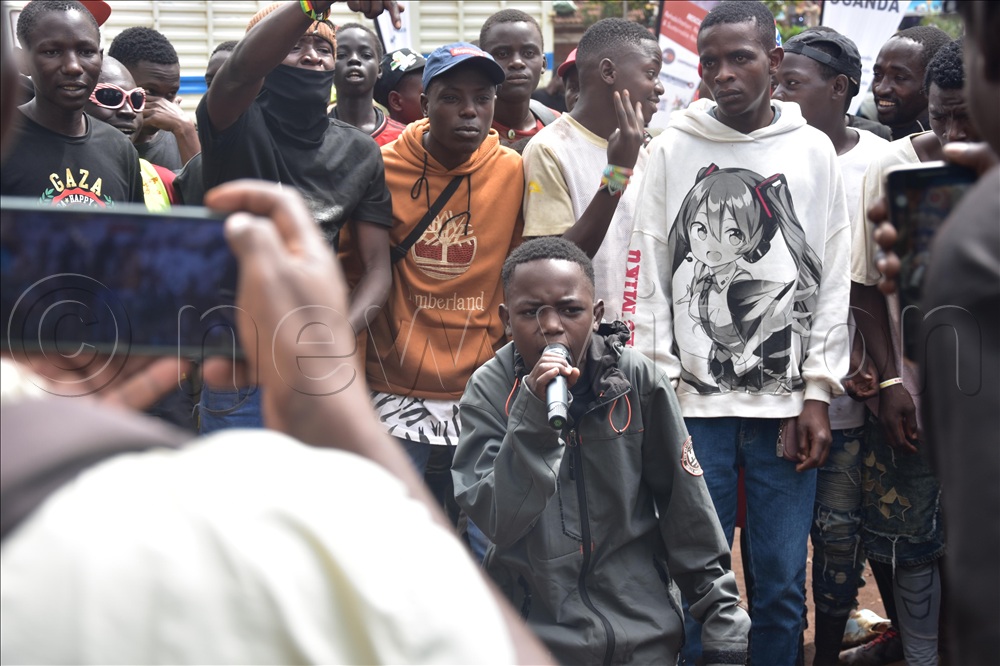 One of the street connected children performing during the commemoration of Street Children at Pan African Square on Wednesday. 