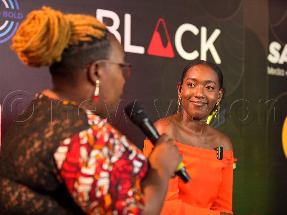 Filmmakers Doreen Nabbanja and Lucky Lora Atwiine having a converstaion at the Ikon Awards nominations 2025. (Photo by Janan Kisitu)