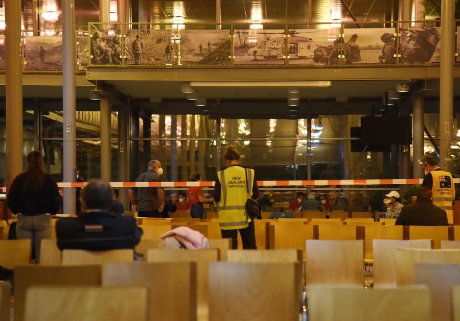 People from the hantavirus-hit cruise MV Hondius wait for transfer in the terminal at Eindhoven Air Base, the Netherlands, on May 12, 2026. (Credit: Xinhua)