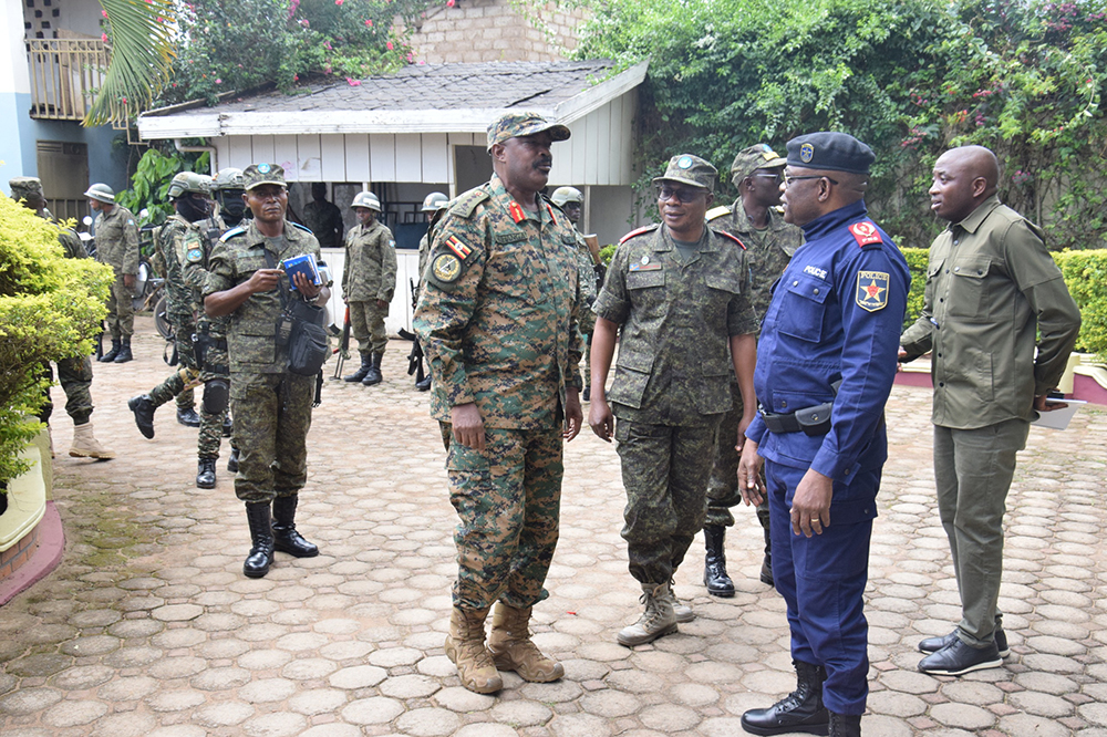 The Commander Land Forces Lt Gen. Kayanja Muhanda interacting with the representative of the Governor North Kivu in Beni. (Courtesy)