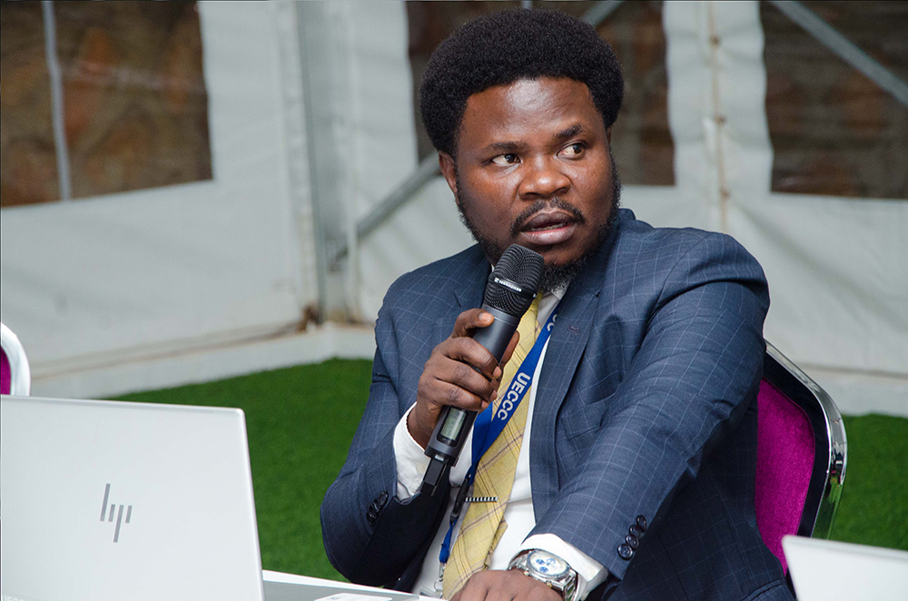Desmond Tutu Opio, Senior Monitoring & Evaluation specialist Uganda Energy Credit Capitalisation Company (UECCC) speaking. PPU PHOTO