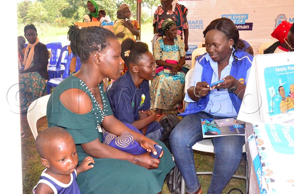 Women receiving family planning services as part of the self care event activities. (Credit: Agnes Kyotalengerire)