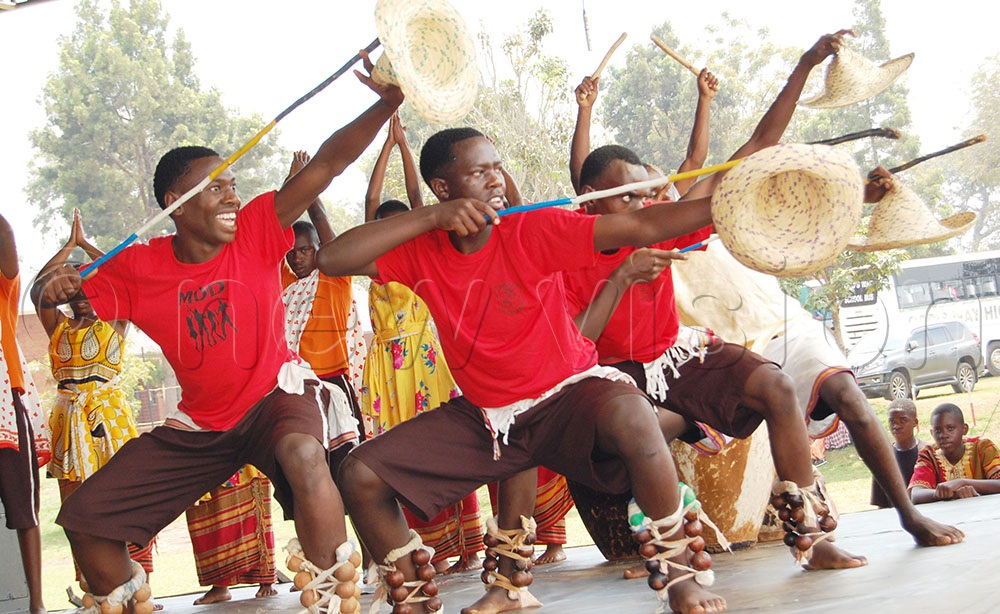 Students from St. Jerome SS Ndama prerform a cultural dance from Western Uganda. (Photo by Mathias Mazinga)