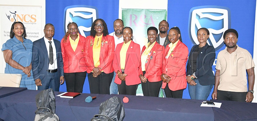 Milton Chebet (2nd left) the NCS Assistant General Secretary-Technical poses with national team members Peace Kabasweka (5th right) and Melon Kyomugisha (3rd right) alongside coach Flavia Namakula (center) ULGU president Rita Apell (4th left) and team managers Charity Atuhaire (3rd left) and Paul Habyarimana (4th right) and some of the sponsors representatives at NCS Headquarters. Photo by Michael Nsubuga