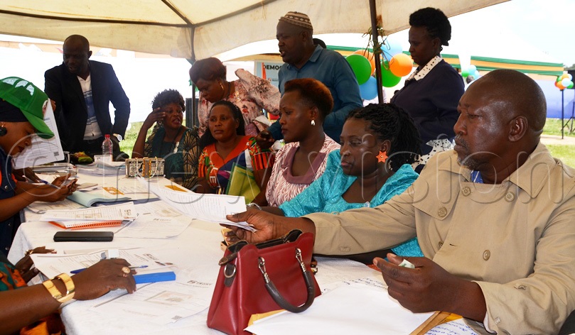 Masaka district council chairman, Andrew Batemyeto picking his nomination forms for the Bukoto Central Parliamentary seat. (Photo by Dismus Buregyeya)