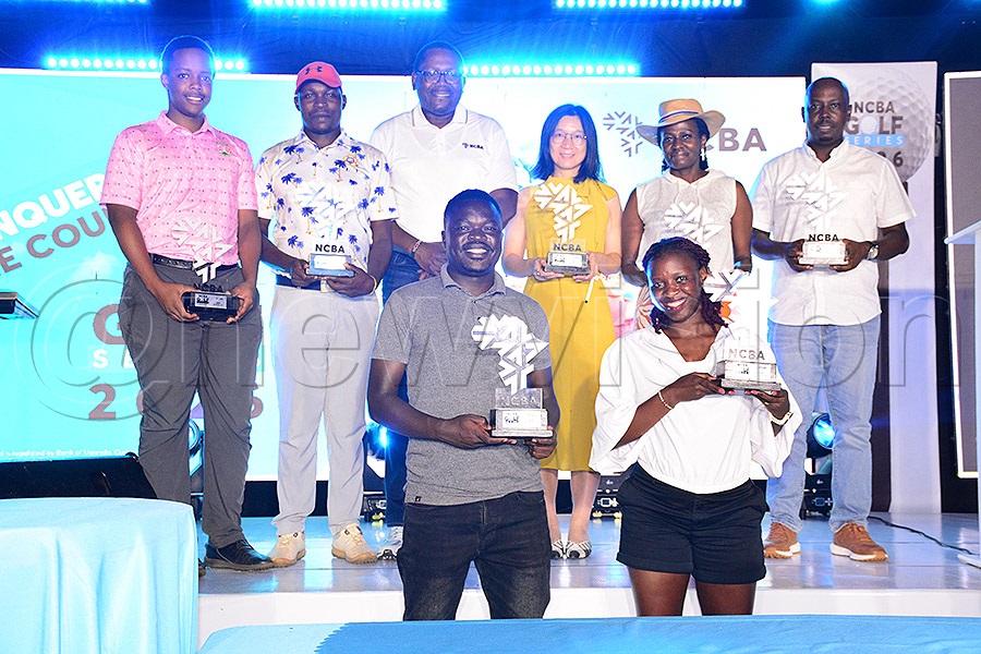 Joseph Cwinyaai and Martha Babirye (front) and NCBA Bank CEO Mark Muyobo (3rd left-back) pose with the rest of the winners after the first leg of the NCBA Golf Series at Kitante, June 13, 2026. Photo by Michael Nsubuga