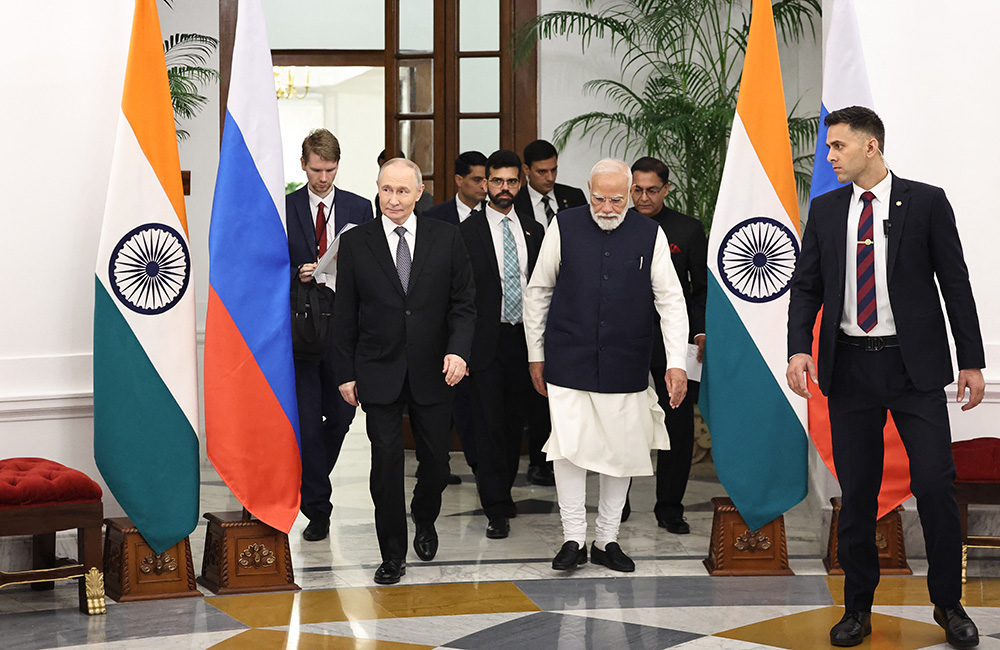 Russia's President Vladimir Putin and India's Prime Minister Narendra Modi are seen after their talks at the Hyderabad House in New Delhi on December 5, 2025. (Photo by Alexander KAZAKOV / POOL / AFP)