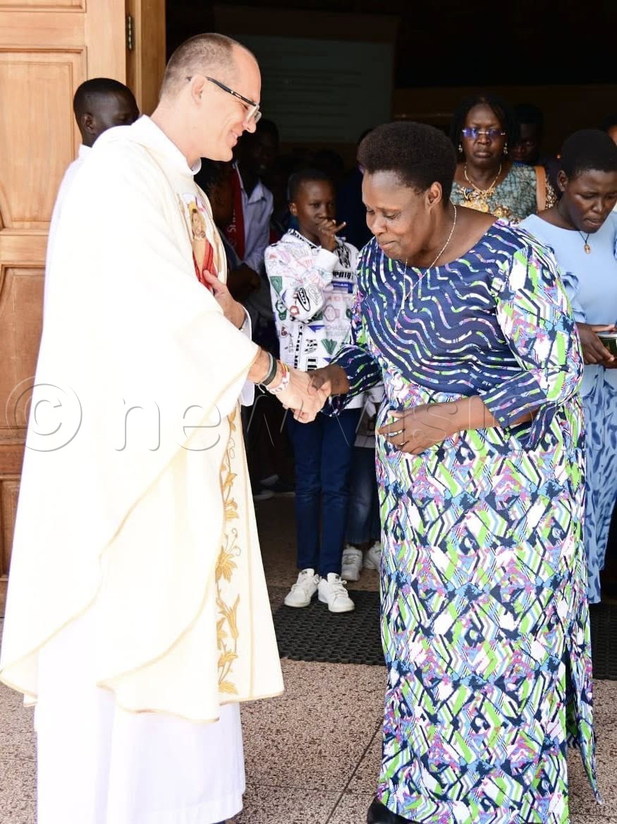 The Parish Priest of Munyonyo Martyrs Shrine, Fr Ulman Wojtek a.k.a Fr Male welcomes HE Vice President Jessica Alupo before evening Mass on Sunday May 3, 2026. (Photo by Juliet Anna Lukwago)