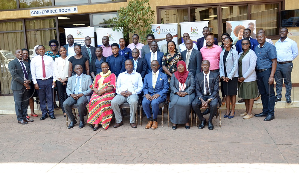 Participants pose for a group photo during the Uganda PEN-plus national stakeholders meeting in Kampala recently. (Photo by Agnes Kyotalengerire)