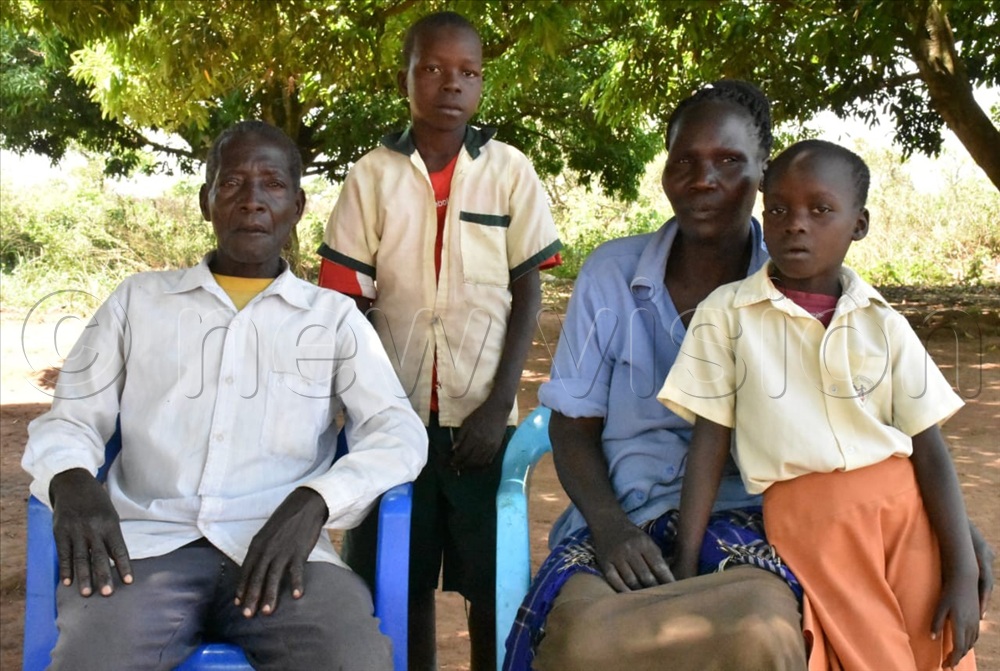 Vicky Ajok's Parents, Simon Kitara and Beatrice Oyella together with Ajok's two children.