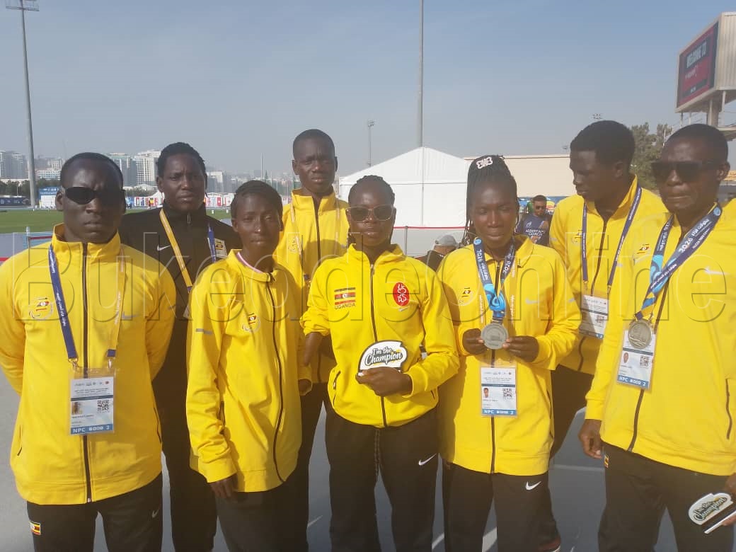 Abamu ku bannayuganda abawangudde emidaali nga bali n'omutendesi waabwe Vincent Mutagubya