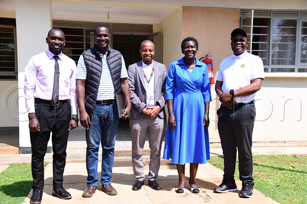 Dr Stella Amero Eduan, the dean of students posing for a picture with Max Adii, the project lead on jacket and sponsors. (Photo by Godfrey Ojore)