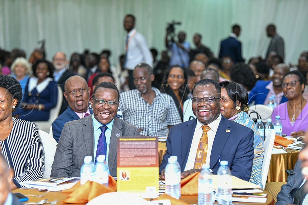 Guests having a light moment at the book launch.