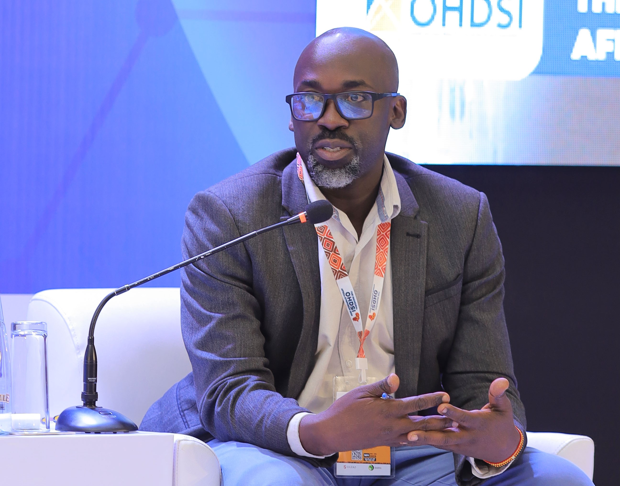 Paul Mbaka the assistant commissioner of health services in charge of health information management at the Ministry of Health addressing delegates at the OHDSI Symposium. Photo by Agnes Kyotalengerire