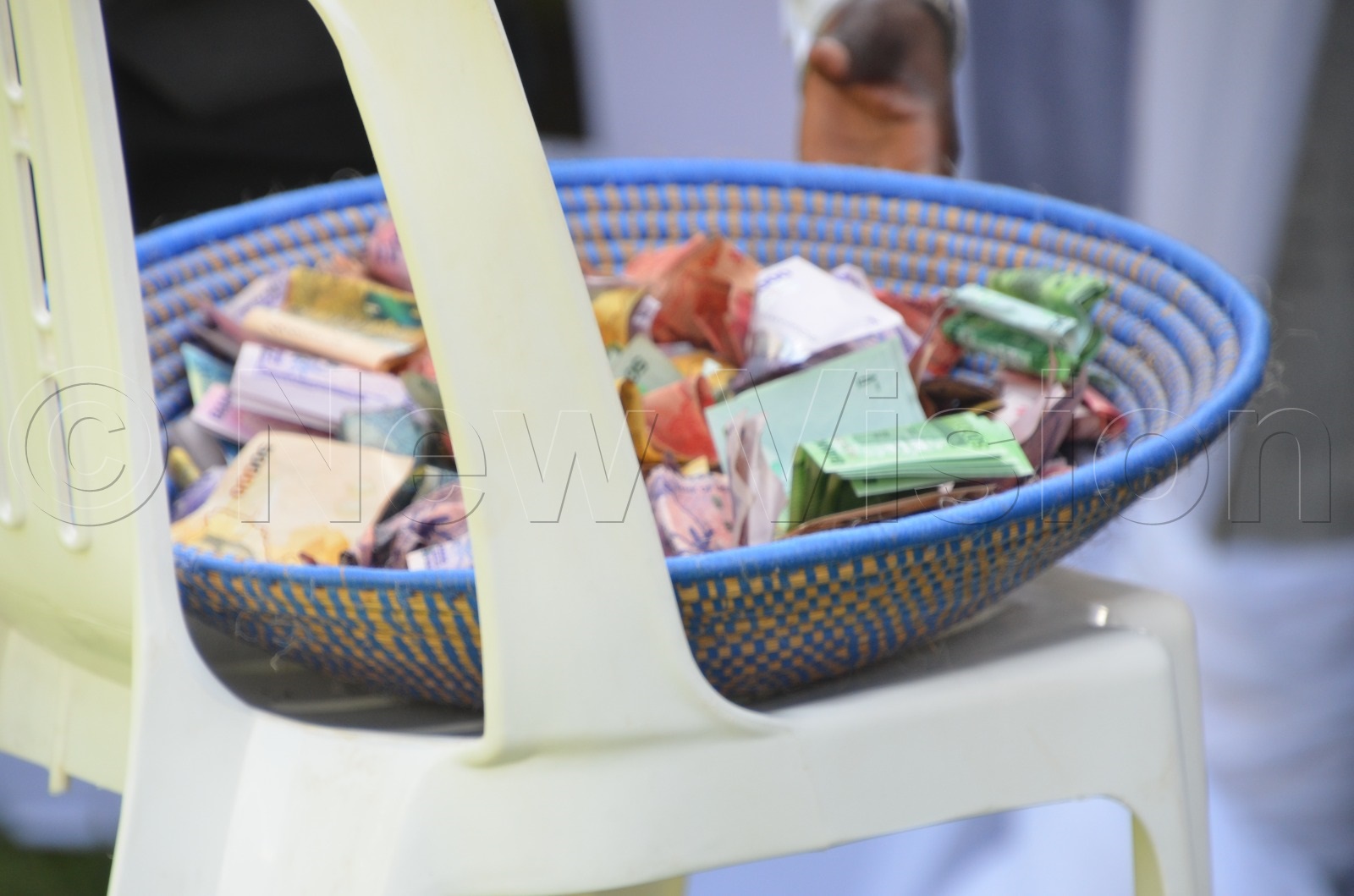 Money in the offertory basket.