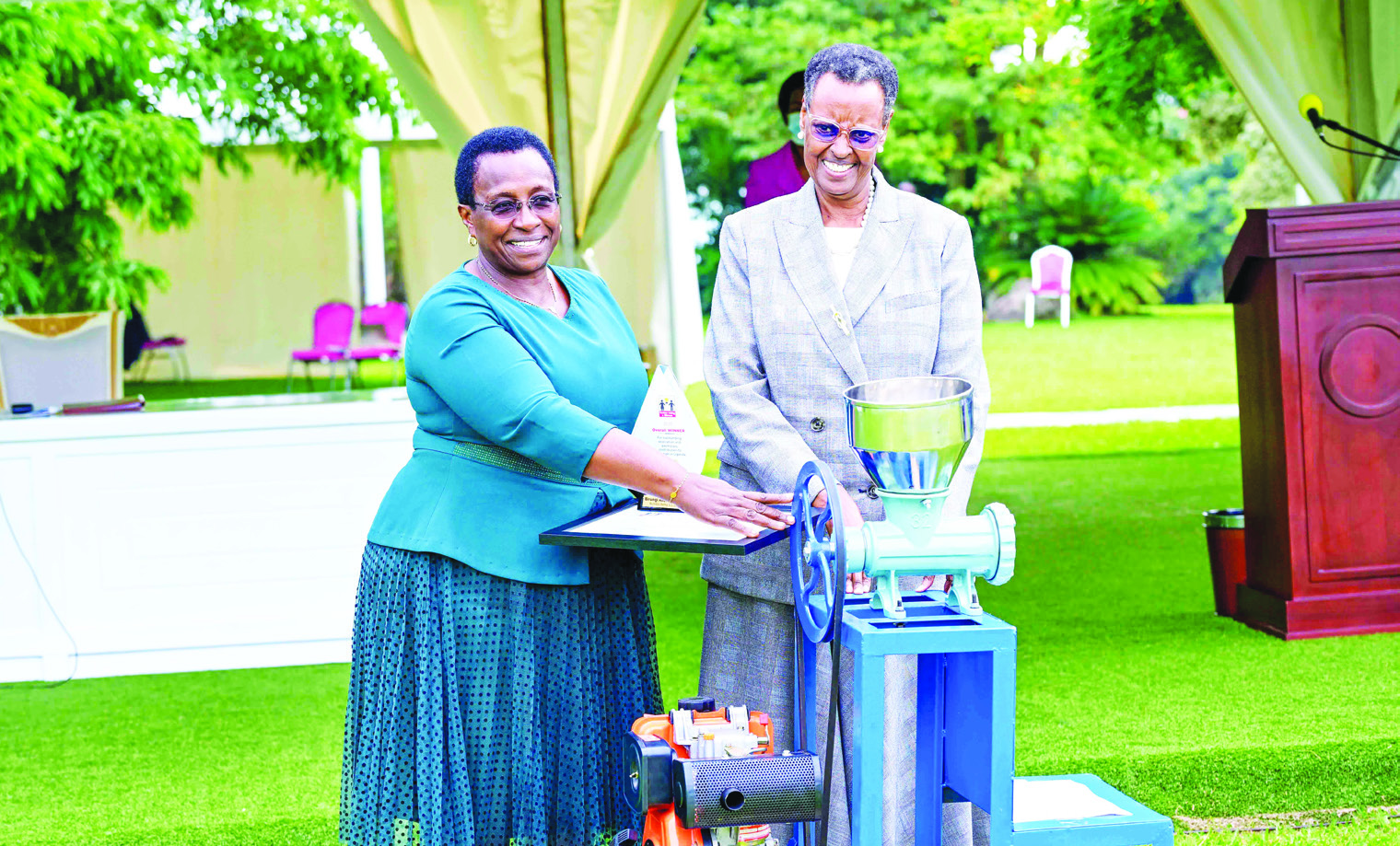 Alice Mary Birungi Baruga with the First Lady and Minister of Education and Sports, Janet Museveni.