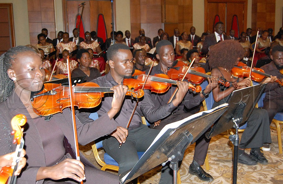 Africa Institute of Music violin maestros spicing Christ the King Church Choir's Christmas concert.Photo by Mathias Mazinga 