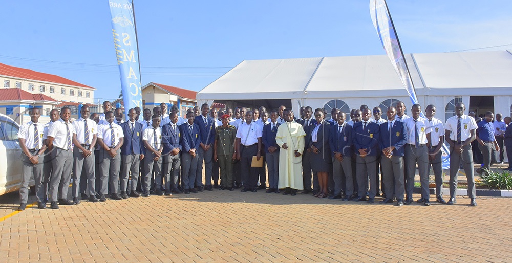 Col Edith Nakalema with some of the students and staff of St. Mary's College, Kisubi. (Credit: Julius Luwemba)