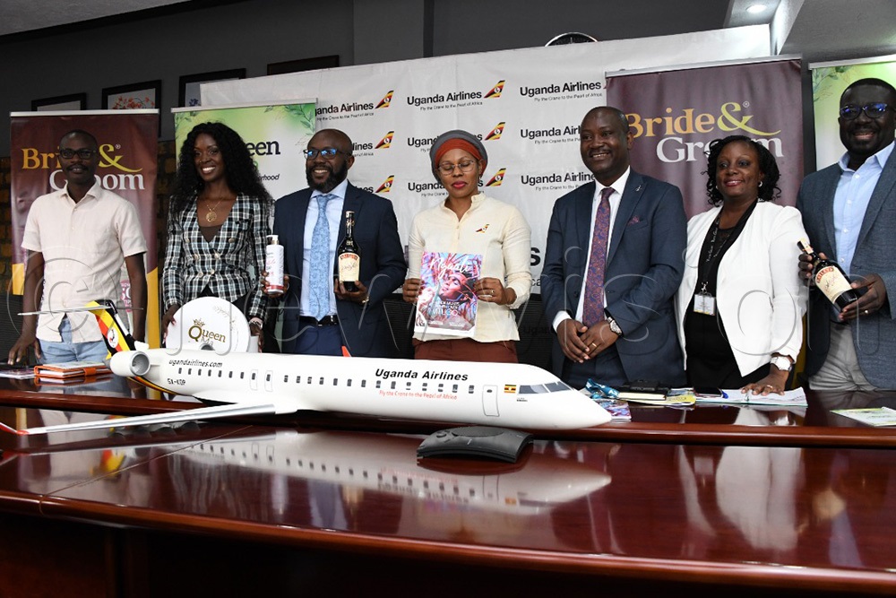 (L-R): Cheman Salem, Uganda Breweries Ltd Trade Quality Manager, producers of Bailey's De Light product, Dora Mwima, Proprietor of Queen Ma, Don Wanyama, CEO Vision Group, Rahim Shakila Lamar, manager Public Relations and Corporate Affairs, Uganda Airlines, Deo Nyanzi, Manager Sales and Marketing Uganda Airlines, Phiona Tamale, Events Manager Vision Group and Rogers Anguzu, Head of marketing Vision group at the unveiling of Bride and Groom Expo co-sponsors. (All Photos by Mpalanyi Ssentongo)