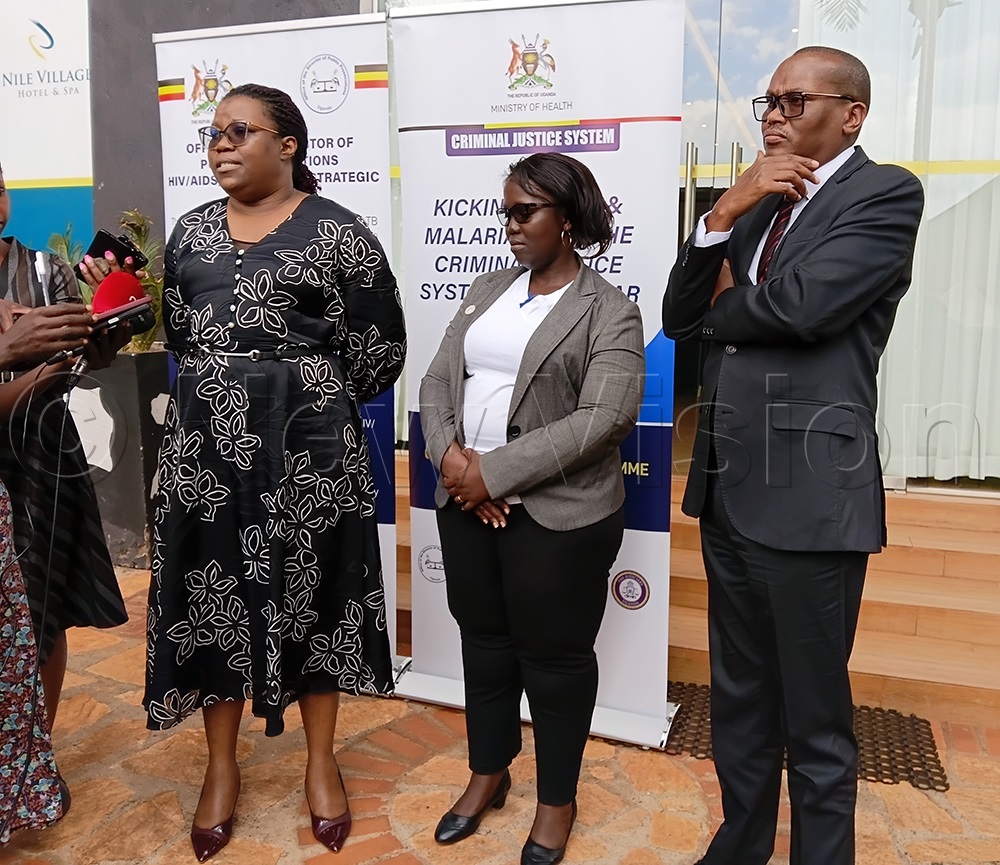 Justice Barbra Masinde (Left), the program coordinator in the office of the DPP, and to the right is the deputy registrar, Festo Nsenga, speaking to the press after the closure of the meeting. (Credit: Doreen Musingo)