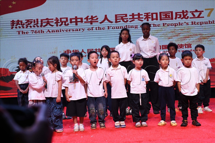 Chinese children perform a poem during the 76th anniversary of China.