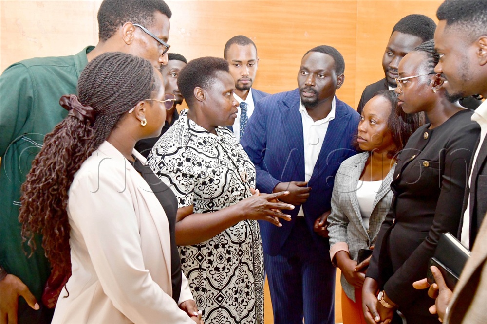 Vice President Jessica Alupo interacting with some Executive Committee Members of the National Youth Council.
