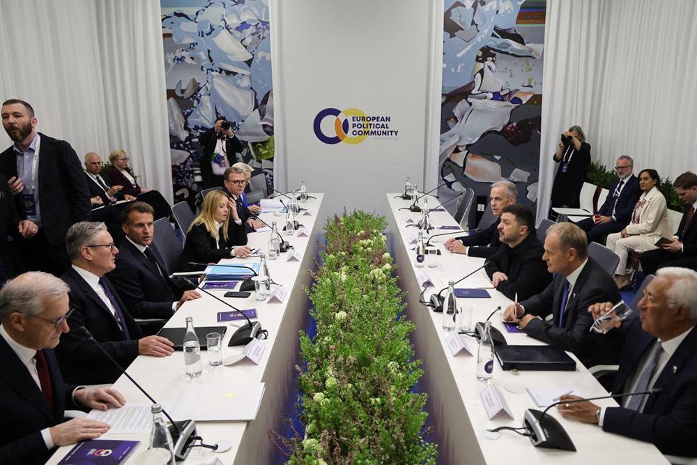 Participants, including Britain's Prime Minister Keir Starmer, France's President Emmanuel Macron, Italy's Prime Minister Giorgia Meloni, European Commission President Ursula von der Leyen, Canada's Prime Minister Mark Carney, Ukraine's President Volodymyr Zelensky, Poland's Prime Minister Donald Tusk and European Council President Antonio Costa, attend a roundtable discussion on Ukraine on the sidelines of the 8th European Political Community (EPC) summit in Yerevan on May 4, 2026. 