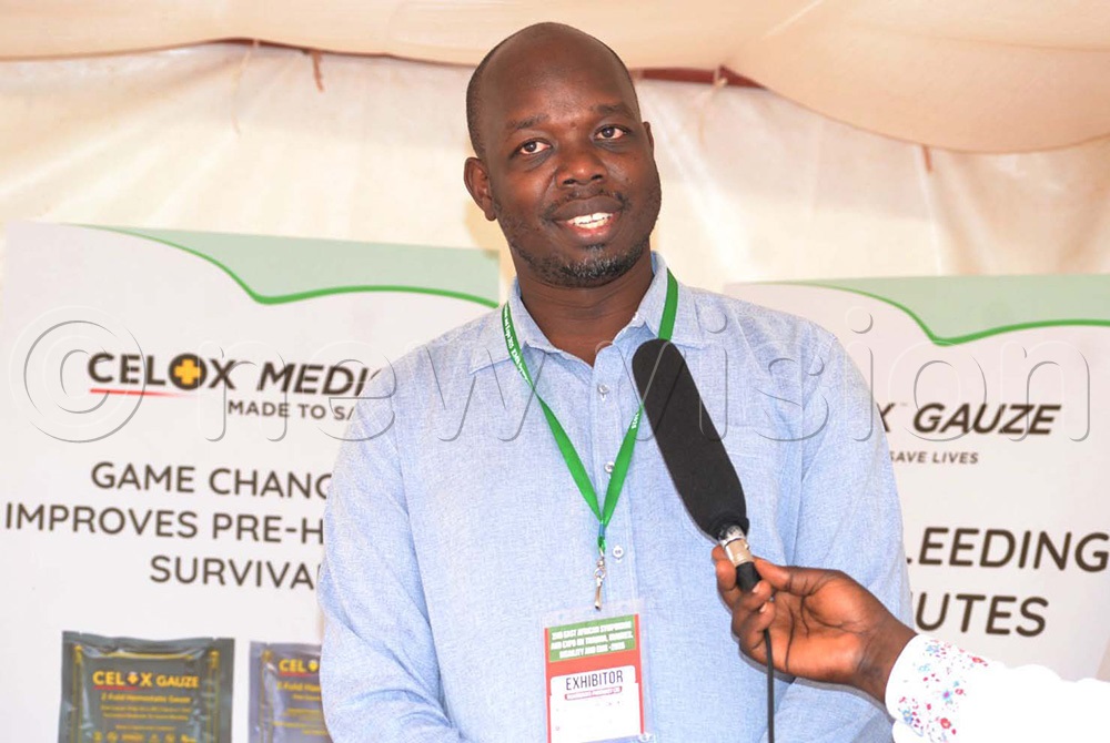 Ibrahim Asiku, a pharmacist at Silverbacks Pharmacy addresing journalists during the stakeholders workshop at Makerere University. (Photo by Juliet Kasirye)