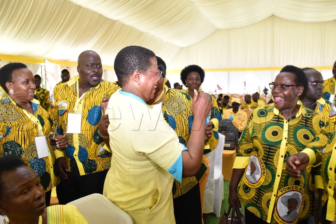 Among shares a light moment with delegates at the NEC meeting at State house.