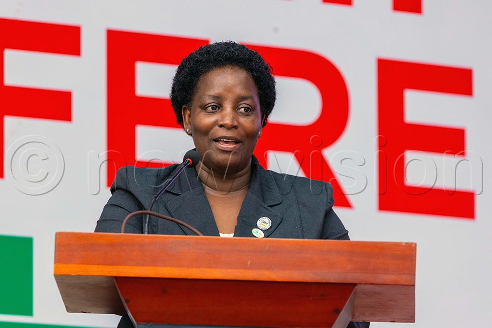 Nambalirwa Nkabala welcoming guests, participants and officials from Makerere University during the World Philosophy Day celebrations held at Makerere University Main Hall. (Photo by John Odyek)