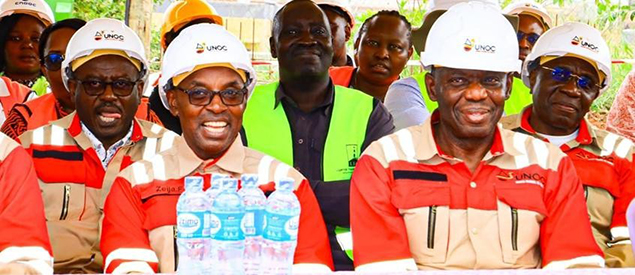 Chief Justice Dr Flavian Zeija (left) and Bank of Uganda Governor Dr Michael Atingi-Ego (right) during a tour of the National Enterprise Corporation (NEC) facilities in Kyangwali on August 5, 2026. (Courtesy)