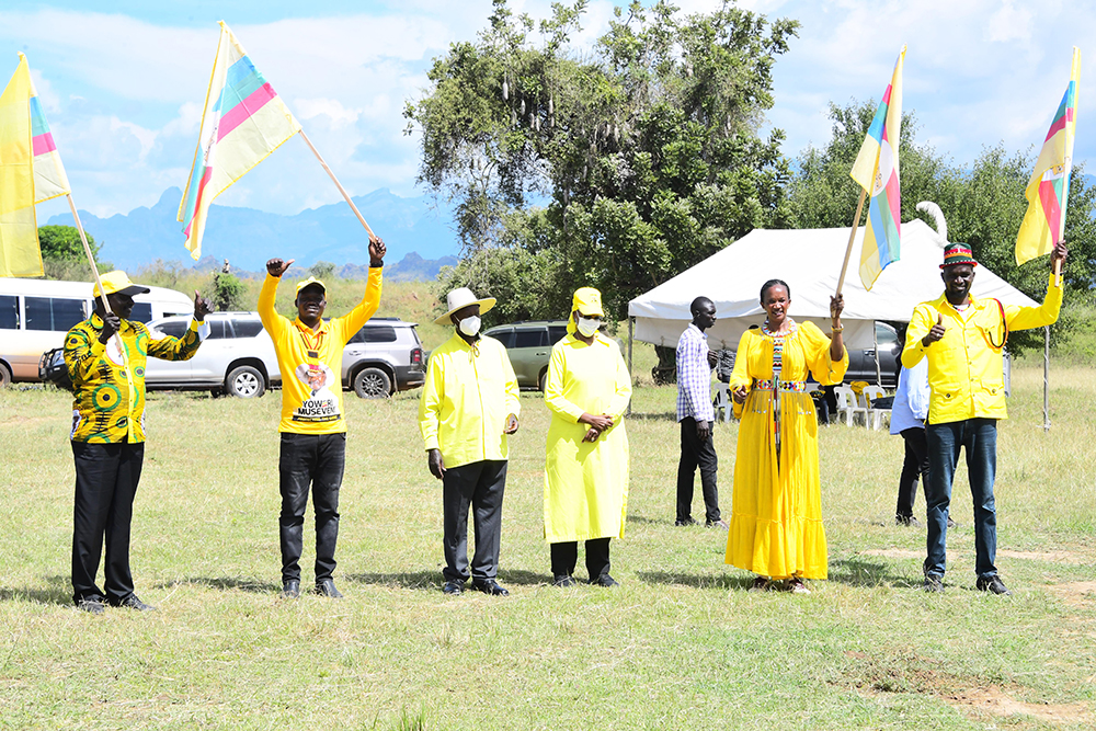 President Museveni and the First Lady, Janet Museveni, joined for a group photo by NRM flag bearers in Nakapiripirit district. (PPU)