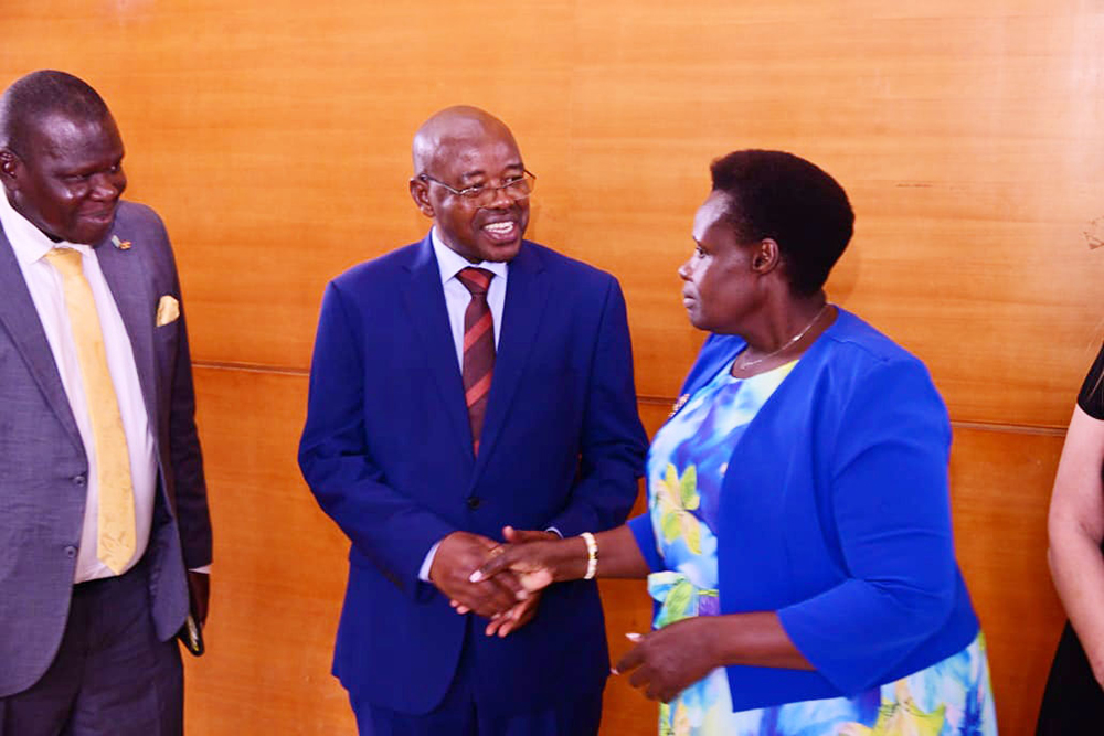 Vice President Jessica Alupo greeting Hon. Amos Lugolobi after the virtual press briefing. (Courtesy)