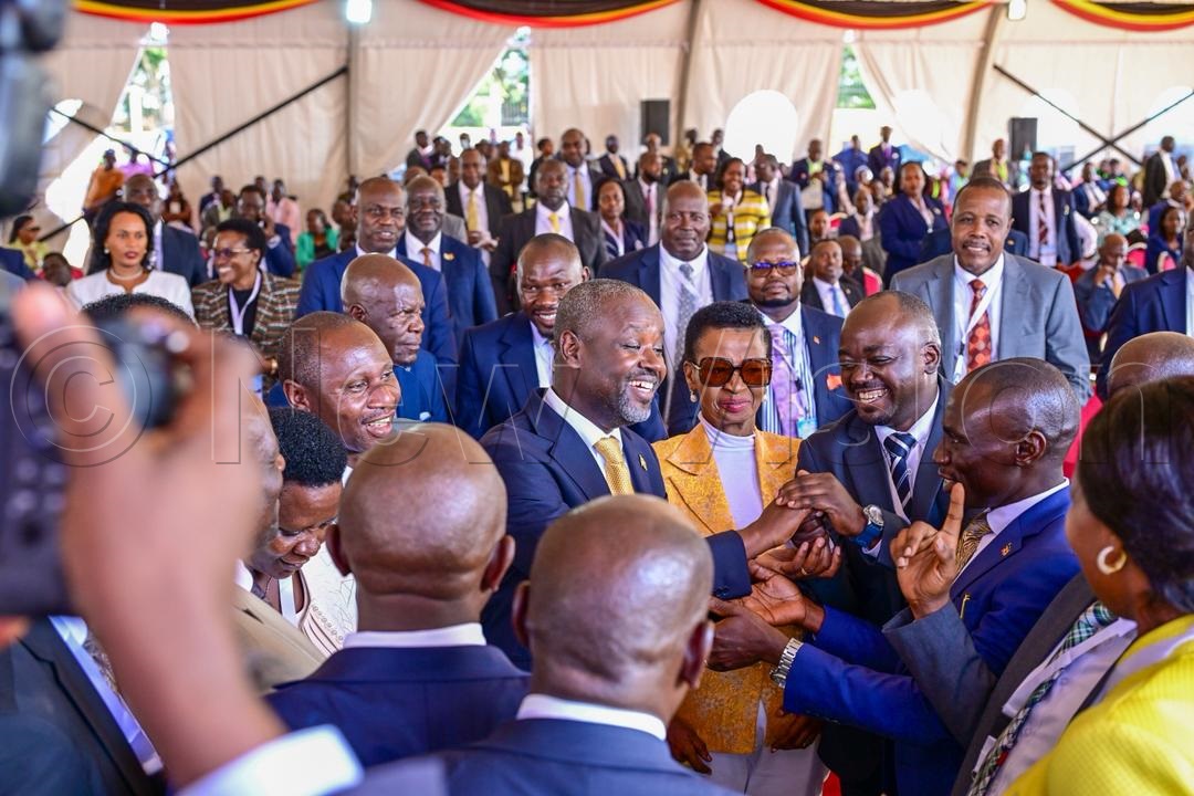 MPs surround Thomas Tayebwa in congratulating him upon election as deputy speaker of 12th parliament. (Credit: Miriam Namutebi)
