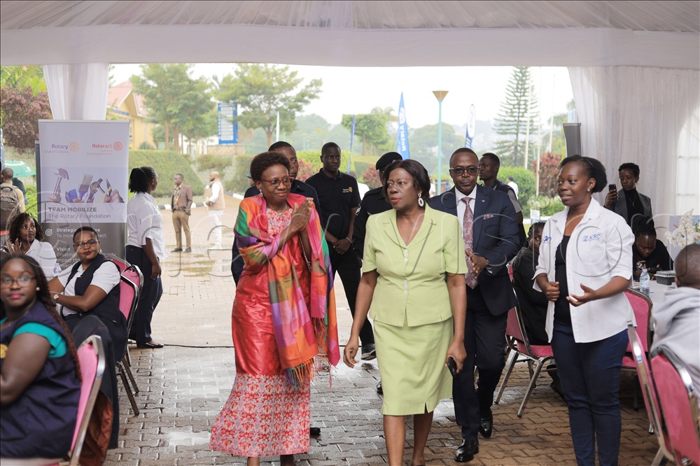 Minister for Health Dr Jane Ruth Aceng welcomed by Dr Cissy Kityo the Executive director Joint Clinical Research Centre and the president Rotary club of Kampala Springs Robert Ssemuwemba.