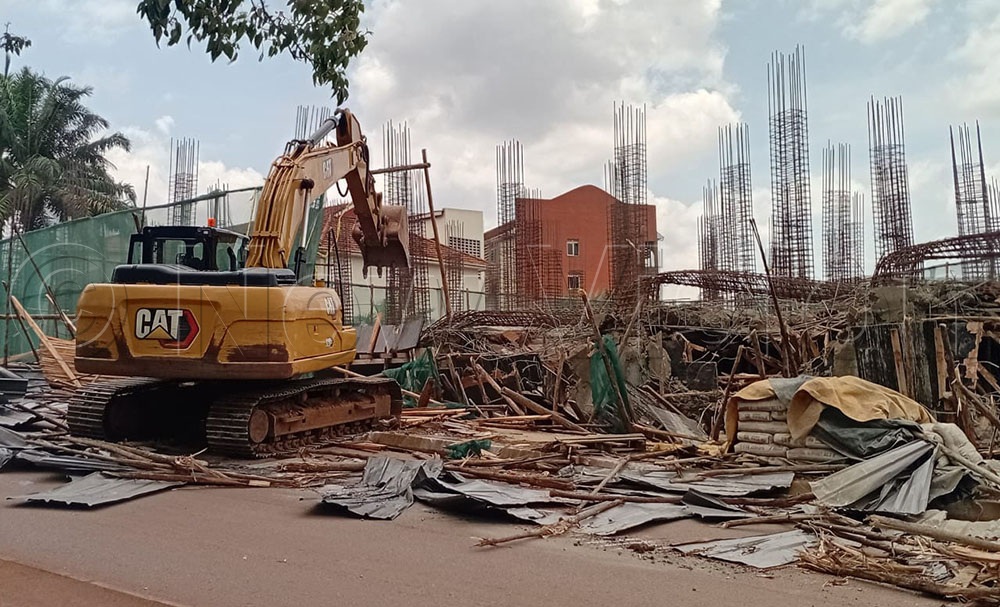 NuweAbine said the structure had encroached on a road reserve, urging that KCCA restore the place to its original space. (Credit: Juliet Waiswa)