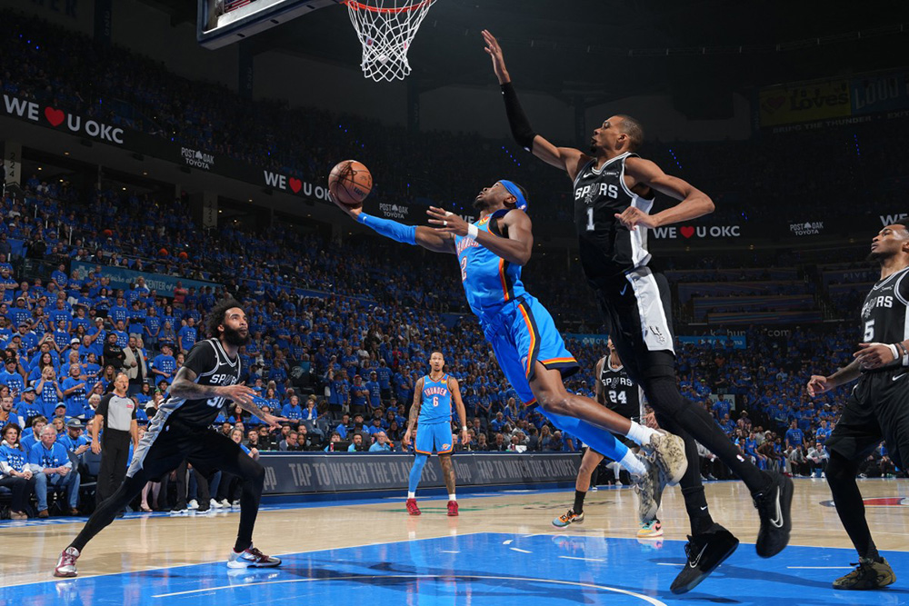 Shai Gilgeous-Alexander #2 of the Oklahoma City Thunder drives to the basket during the game against the San Antonio Spurs during Game Seven of the NBA Western Conference Finals on May 30, 2026 at Paycom Center in Oklahoma City, Oklahoma. (Photo by Jesse D. Garrabrant/NBAE via Getty Images/AFP)