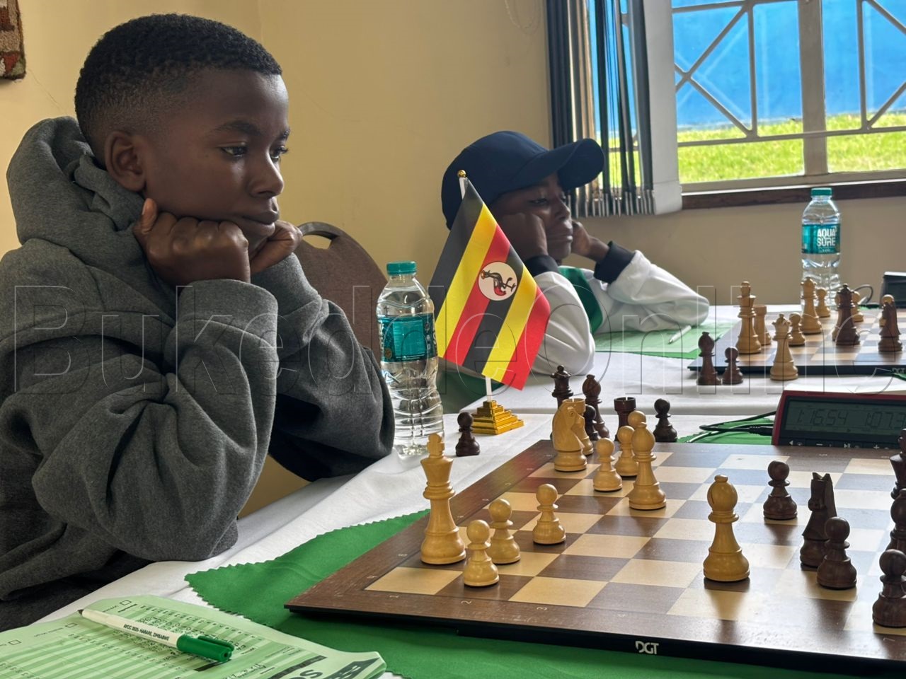 Apollo Ahumuza nga ali mu nsiike